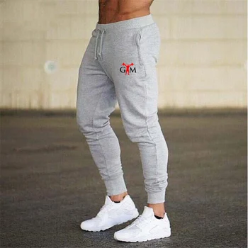Nuevos productos para el otoño y el invierno de la marca de gimnasia de los hombres pantalones de jogging de ropa deportiva de alta calidad culturismo pantalones con pantalones
