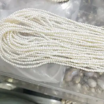Envío gratis a 39 CM,1.5-2 mm mini cerca de redondo de la perla AA buen lustre,el de la naturaleza de perlas de agua dulce en la playa