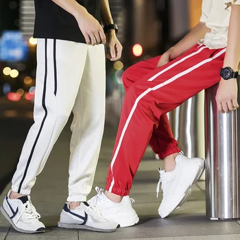 Hip Hop Pantalones de los Hombres De 2018 Plus Tamaño de la Suelta de Ropa para Hombre Pantalón Casual Chicos Lado el Diseño de la Raya de los Hombres Corredores de Pantalones