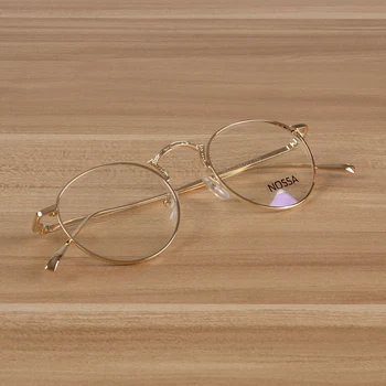 Retro de la moda nueva ronda de marco de metal gafas de marco de los hombres y las mujeres la tendencia de la decoración de espejo plano literario estudiantes de bellas gafas.