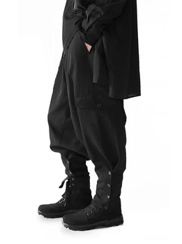 Hip Hop De La Moda De La Marca Suelto Casual Elástico De La Cintura De Color Negro Sólido Tobillo Bandas Pantalones Pantalones Casuales Lado De La Calle Botón Dividir Pantalón