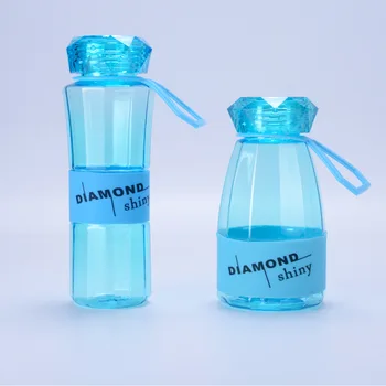Transparente estudiante de moda de la botella de agua de diamante en forma de diamante de la goma de silicona cubierta de plástico resistente al espacio de la botella de agua